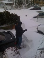 Hubby digging us out.jpg